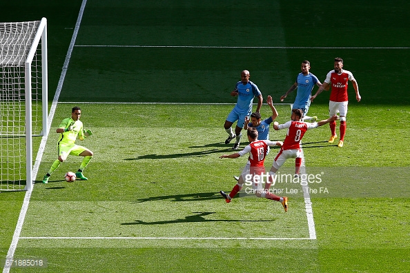 Monreal strikes it past Bravo | Photo: Christopher Lee - The FA via Getty Images