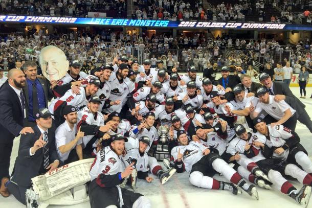 Lake Erie Monsters taking their championship picture with the Calder Cup. | Photo Courtesy: Columbus Blue Jackets