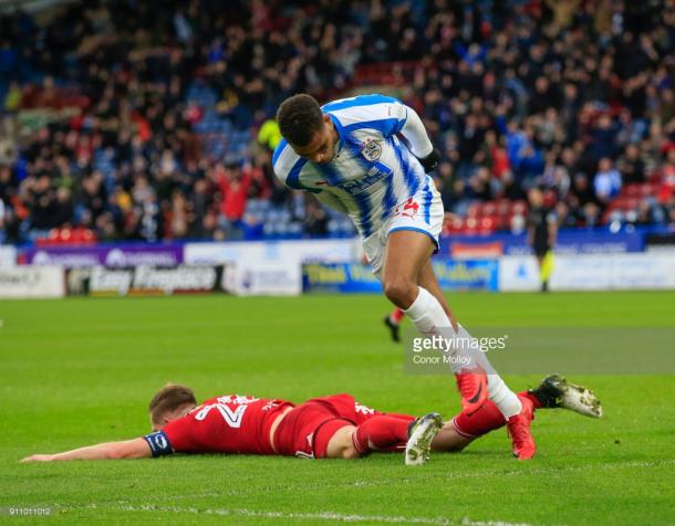 27th January 2018, John Smith's Stadium, Huddersfield, England; FA Cup football, 4th round, Huddersfield Town versus Birmingham City; Steve Mounie of Huddersfield Town turns to celebrate as he scores the opening goal of the game in the 20th minute (Photo by Conor Molloy/Action Plus via Getty Images)