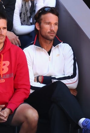 Carlos Moya looks on during Raonic's second round match in Madrid. Photo: Julian Finney/Getty Images