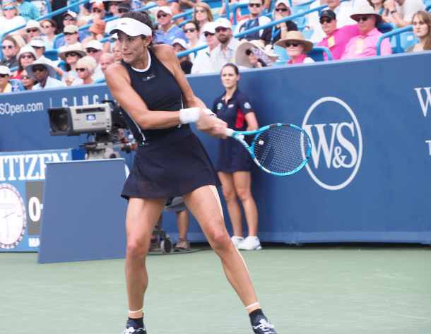 Muguruza lines up a backhand during her finals victory. Photo: Noel Alberto