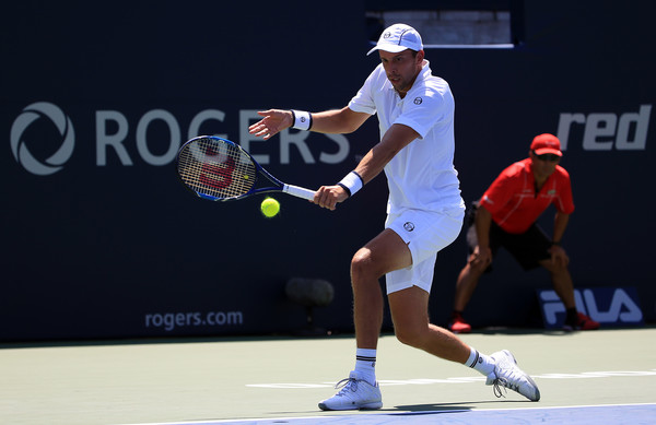 Gilles Muller hits a backhand during his second round loss on Wednesday. Photo: Vaughn Ridley/Getty Images
