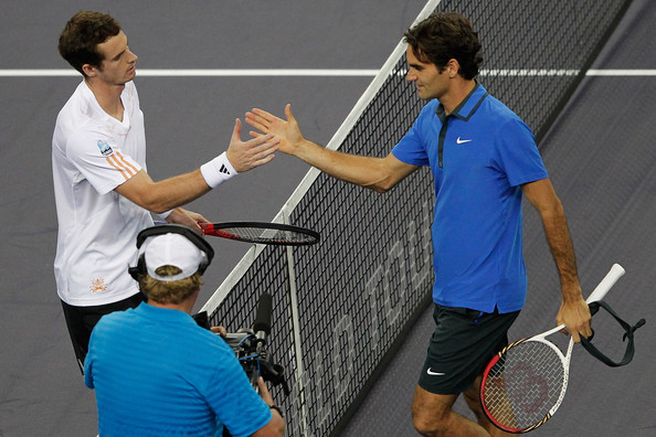 Murray (left) and Federer shake hands after Murray beat Federer at Shanghai in 2012. Photo: Lintao Zhang/Getty Images