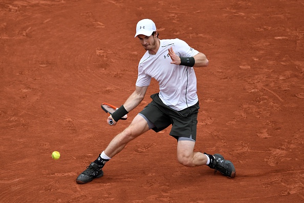 Murray slides into a forehand. Photo: Philippe Lopez/AFP/Getty Images