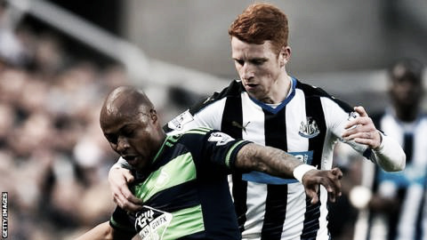 Andre Ayew fighting to keep possession of the ball against Newcastle United. Photo provided by Getty Images.