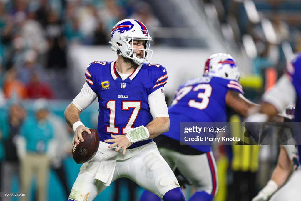  <strong><a  data-cke-saved-href='https://www.vavel.com/en-us/nfl/2023/09/12/1155785-nfl-new-york-jets-season-takes-flight-with-overtime-win-against-buffalo-bills.html' href='https://www.vavel.com/en-us/nfl/2023/09/12/1155785-nfl-new-york-jets-season-takes-flight-with-overtime-win-against-buffalo-bills.html'>Josh Allen</a></strong> #17 of the <strong><a  data-cke-saved-href='https://www.vavel.com/en-us/nfl/2023/10/15/1159276-who-are-the-favorites-in-the-nfls-american-conference.html' href='https://www.vavel.com/en-us/nfl/2023/10/15/1159276-who-are-the-favorites-in-the-nfls-american-conference.html'>Buffalo Bills</a></strong> drops back to pass during an NFL football game against the Miami Dolphins at Hard Rock Stadium on January 7, 2024 in Miami Gardens, Florida. (Photo by Perry Knotts/Getty Images)