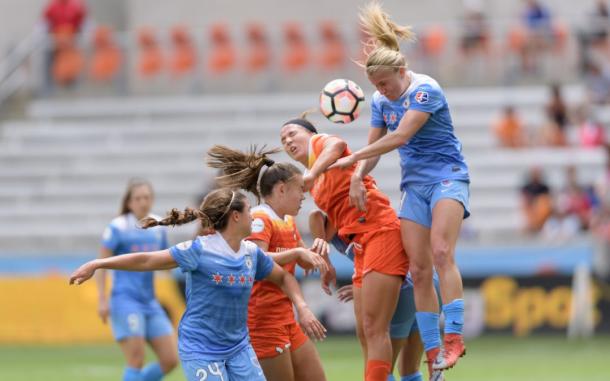 Alyssa Mautz (right) challenges for a header against the Houston Dash last week. Source: Chicago Red Stars