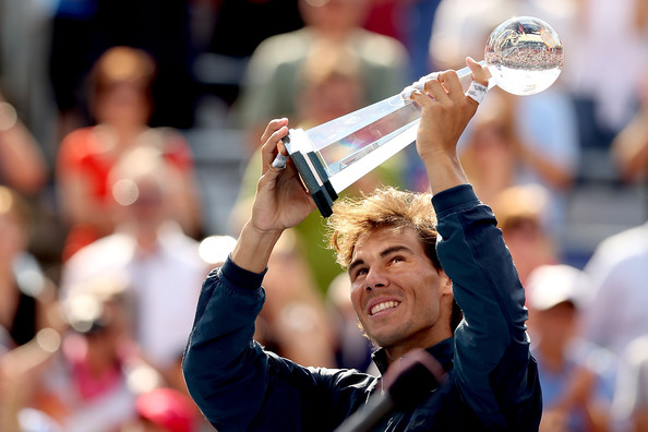Nadal hoists the trophy after winning the 2013 Coupe Rogers. Photo: Matthew Stockman/Getty Images