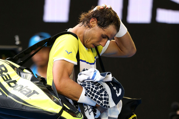 Nadal leaves the court after his disappointing loss in Melbourne. Photo: Michael Dodge/Getty Images