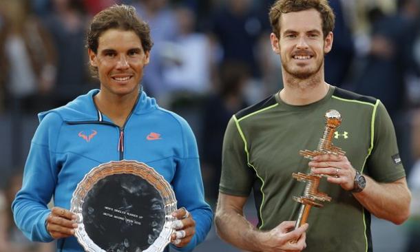 Nadal (left) and Murray hold their trophies after the 2015 Mutua Madrid Open final. Photo: Paul White/AP