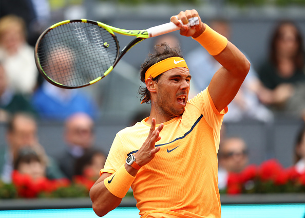 Rafael Nadal hits a forehand during the quarterfinal. Photo: Julian Finney/Getty Images