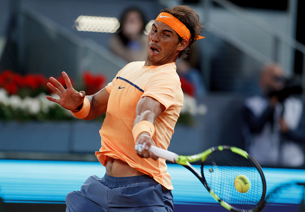 Rafael Nadal crushes a forehand during his third round win. Photo: Guillermo Martinez/Corbis via Getty Images