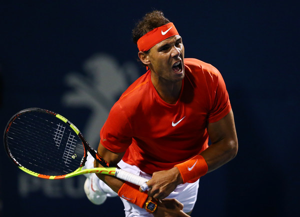 Nadal serves during the quarterfinal win over Cilic. Photo: Getty Images