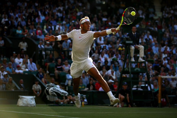 Nadal lunges for a volley on Centre Court on Wednesday. Photo: Clive Brunskill/Getty Images