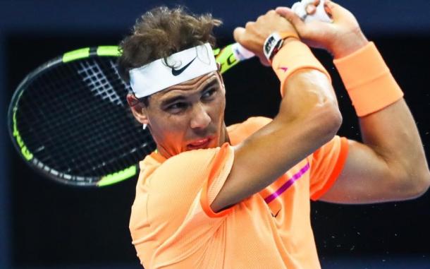 Rafael Nadal follows through on a backhand during his first round win. Photo: China Open