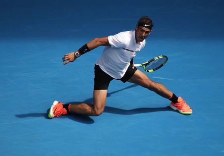 Nadal slides into a forehand. Photo: Mark Kolbe/Getty Images