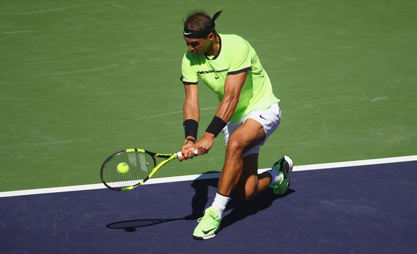Nadal leans into a backhand on Sunday in Indian Wells. Photo: Clive Brunskill/Getty Images