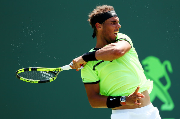 Nadal follows through on a forehand in the semifinals. Photo: Al Bello/Getty Images