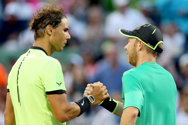 Nadal (left) shakes hands with Dudi Sela after the match. Photo: Matthew Stockman/Getty Images