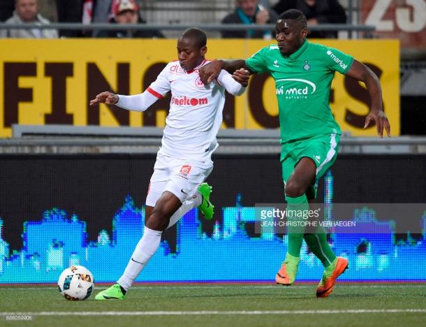  Junior Dale vies with Saint-Etienne's defender Mickael Nade in May. Source - Jean-Christophe Verhaegen/Getty Images.