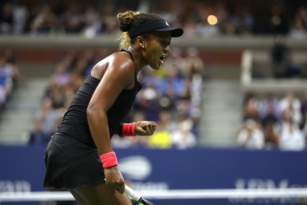 Naomi Osaka celebrates winning a point | Photo: Matthew Stockman/Getty Images North America