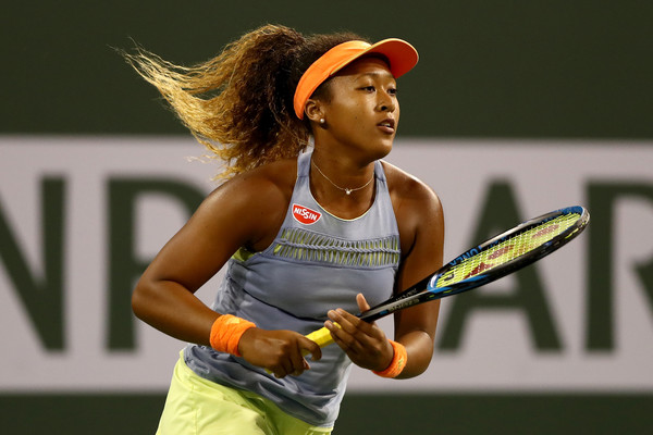 Naomi Osaka looks to ride on her momentum and upset world number one Simona Halep in the semifinals | Photo: Matthew Stockman/Getty Images North America