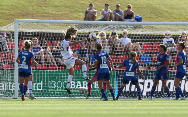 Katie Naughton heads in the game-winning goal for Adelaide United in their 2-1 win over the Newcastle Jets. | Photo: Ashley Feder - Getty Images