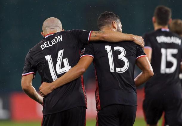 Nick DeLeon (14) and Lamar Neagle (13) hug after one of Neagle's goals against Toronto FC | Source: D.C. United Facebook Page