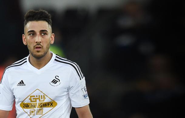 The form of Neil Taylor means that Franck Tabanou has not been able to get into Swansea's team. (Football Fancast)