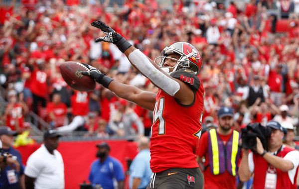 Running back Charles Sims #34 of the Tampa Bay Buccaneers celebrates his touchdown during the fourth quarter of an NFL football game against the New York Jets. |Source: Brian Blanco/Getty Images North America|