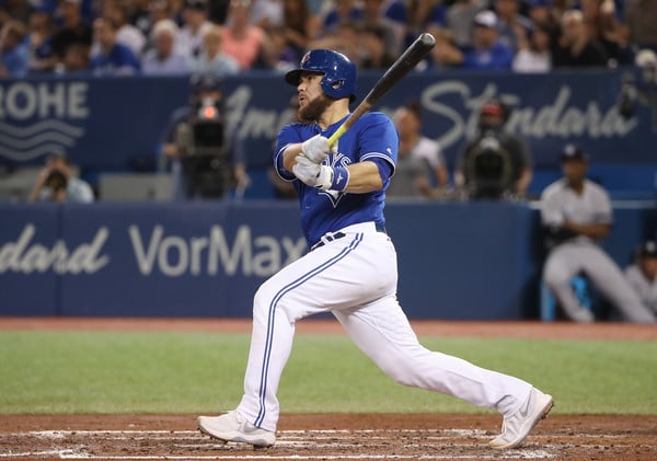 Russell Martin hit a two-run shot just over the field in left in the fourth to extend the Blue Jays’ lead to 4-1. | Photo: Tom Szczerbowski/Getty Images