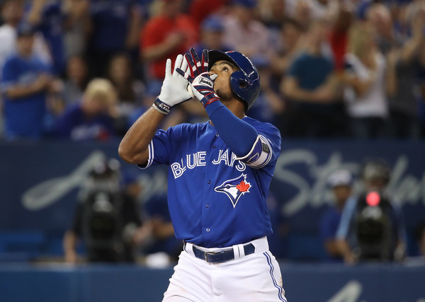 Teoscar Hernández hit a solo shot over the fence in left field to score the go-ahead run for Toronto in the third. | Photo: Tom Szczerbowski/Getty Images