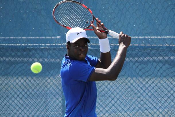 Nicaise Muamba hits a backhand slice against Jack Mingjie Lin during the final of the 2016 U18 Rogers Junior National Championships. | Photo: Max Gao