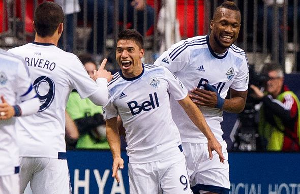 Nicolas Mezquida (center, #9) celebrating with teammates after scoring a goal in March 2015. Photo credit: Rich Lam/Getty Images Sport