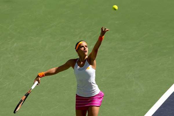 Nicole Gibbs serves to Petra Kvitova of Czech Republic during the BNP Paribas Open at the Indian Wells Tennis Garden on March 15, 2016 in Indian Wells, California. | Photo: Matthew Stockman/Getty Images North America