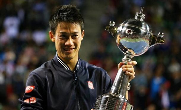 Kei Nishikori holds his Tokyo trophy back in 2014. Photo: Getty Images
