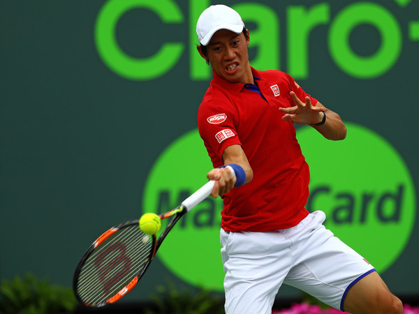 Kei Nishikori hits a forehand in the 2016 Miami final. Photo: Mike Ehrmann/Getty Images