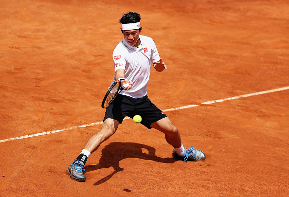 Kei Nishikori is aiming for a spot in the final four in Rome, but needs to get by Dominic Thiem next. | Photo: Matthew Lewis/Getty Images
