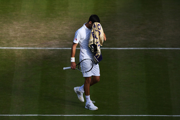 Novak Djokovic of Serbia looks dejected during the Men's Singles third round match against Sam Querrey of The United States on day five of the Wimbledon Lawn Tennis Championships at the All England Lawn Tennis and Croquet Club on July 1, 2016 in London, England. (Photo by Shaun Botterill/Getty Images)