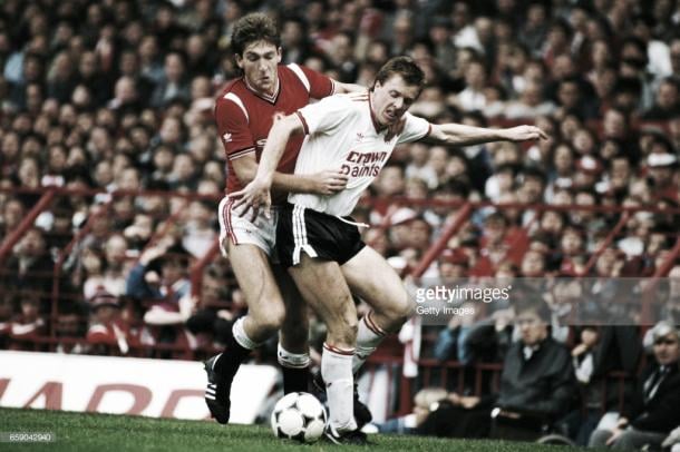 Whiteside tussles with Liverpool's Steve Nicol (Photo: Getty Images)