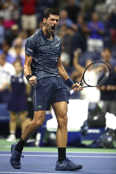Djokovic roars in delight after the win | Photo: Julian Finney/Getty Images North America