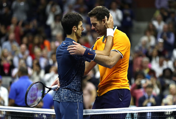 The two champions embrace after their fourth meeting at a Grand Slam event (Image source: Al Bello/Getty Images North America)