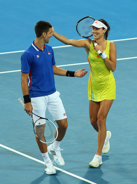 Novak Djokovic and Ana Ivanovic joke around in-between points during the 2014 Hopman Cup. | Photo: Paul Kane/Getty Images AsiaPac