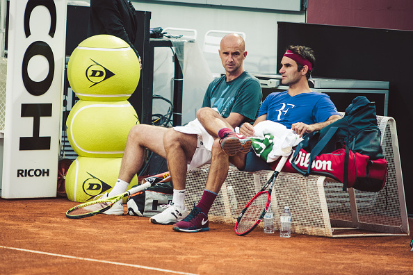 Federer sits with his coach, Ivan Ljubicic, during his practice in Rome. Credit: NurPhoto/Getty Images