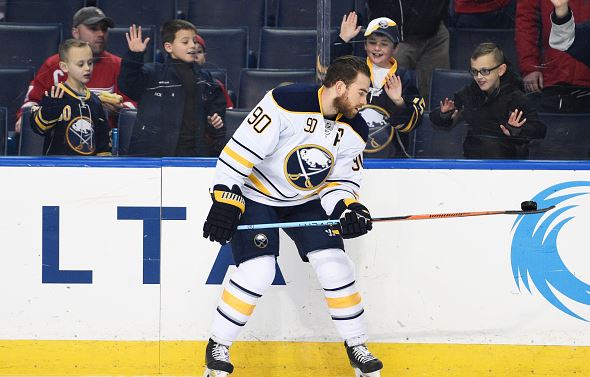 Ryan O'Reilly #90 of the Buffalo Sabres picks up a puck with his stick during warmups during the game against the Detroit Red Wings on Friday, January 22, 2016 at the First Niagara Center in Buffalo, New York. (Photo by Tom Brenner/ Getty Images