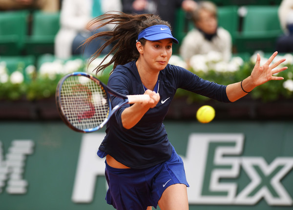 Oceane Dodin returns a serve at the French Open in Paris/Getty Images