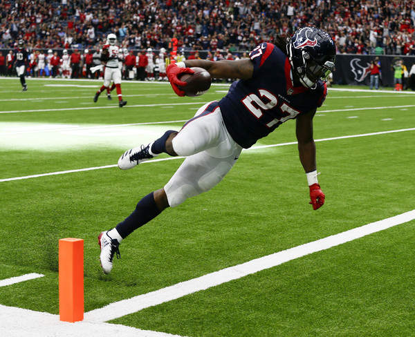 D'Onta Foreman #27 of the Houston Texans runs 34 yards for a touchdown in the fourth quarter against the Arizona Cardinals. |Source: Bob Levey/Getty Images North America|