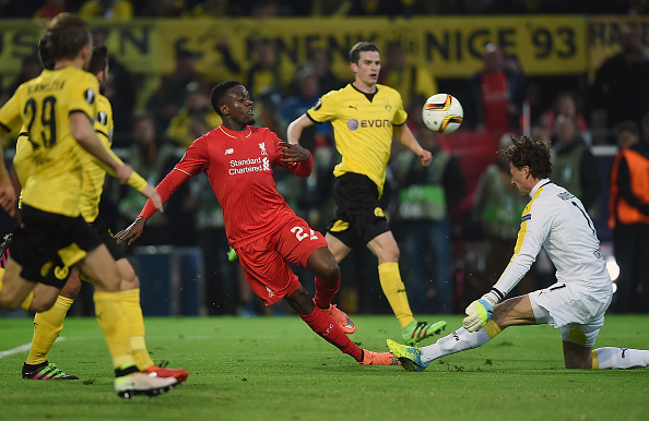 Divock Origi sees his effort on goal saved by Dortmund keeper Roman Weidenfeller. (Getty)