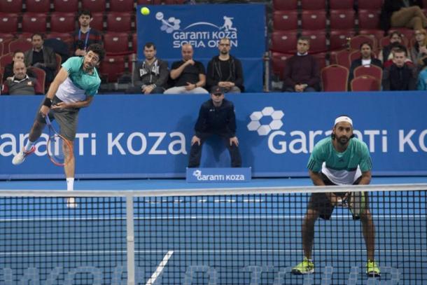 Philipp Oswald (left) serves during quarterfinal action along with Adil Shamasdin (Photo: Garanti Koza Sofia Open)