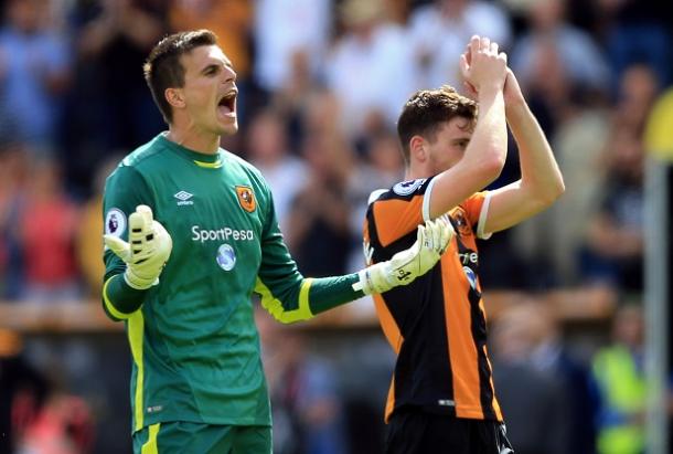 Jakupovic and Robertson celebrate the victory (Photo: Getty Images)